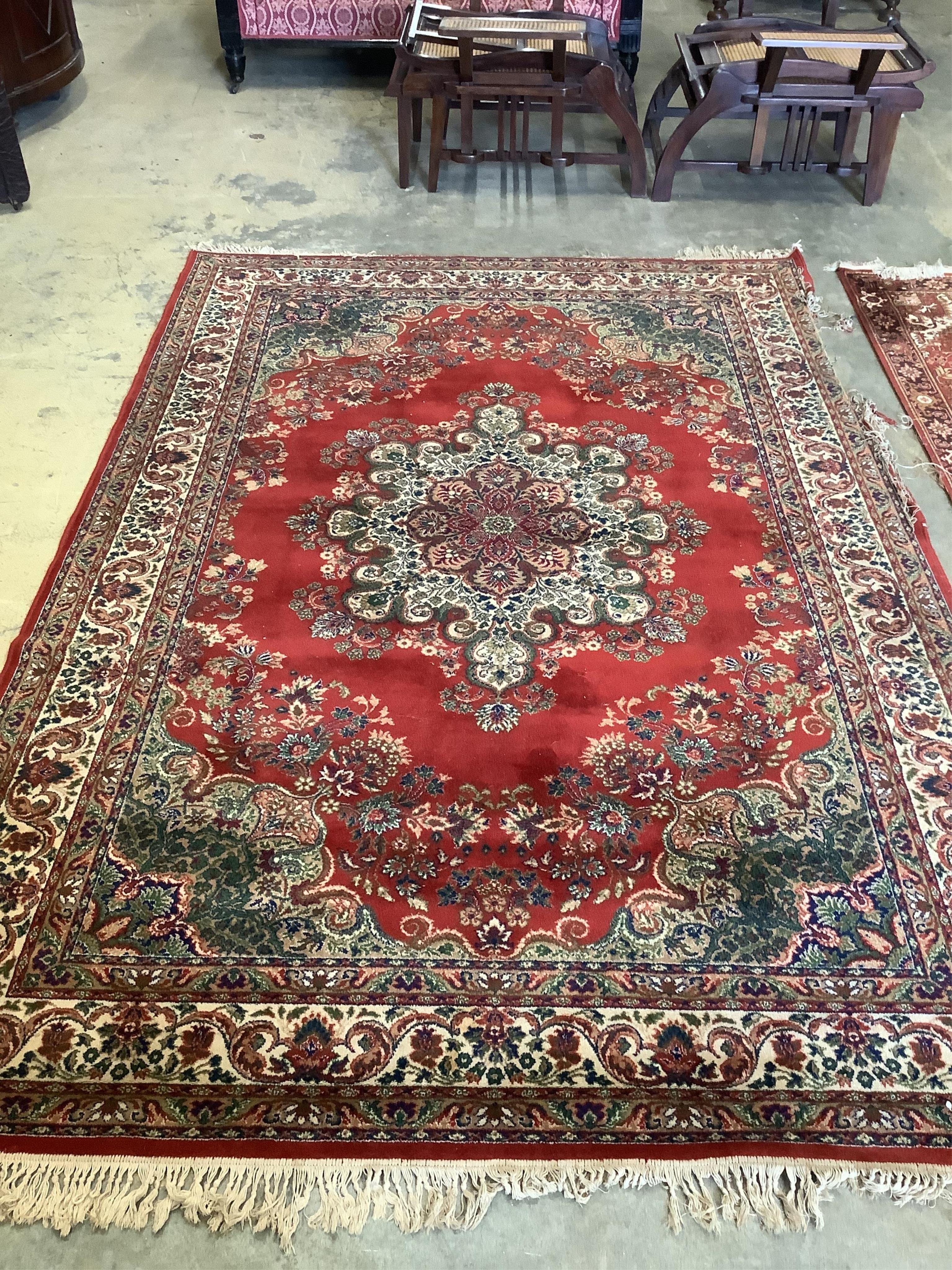 A Kandahar red ground rug and a similar runner, larger 294 x 200cm (2). Condition - poor